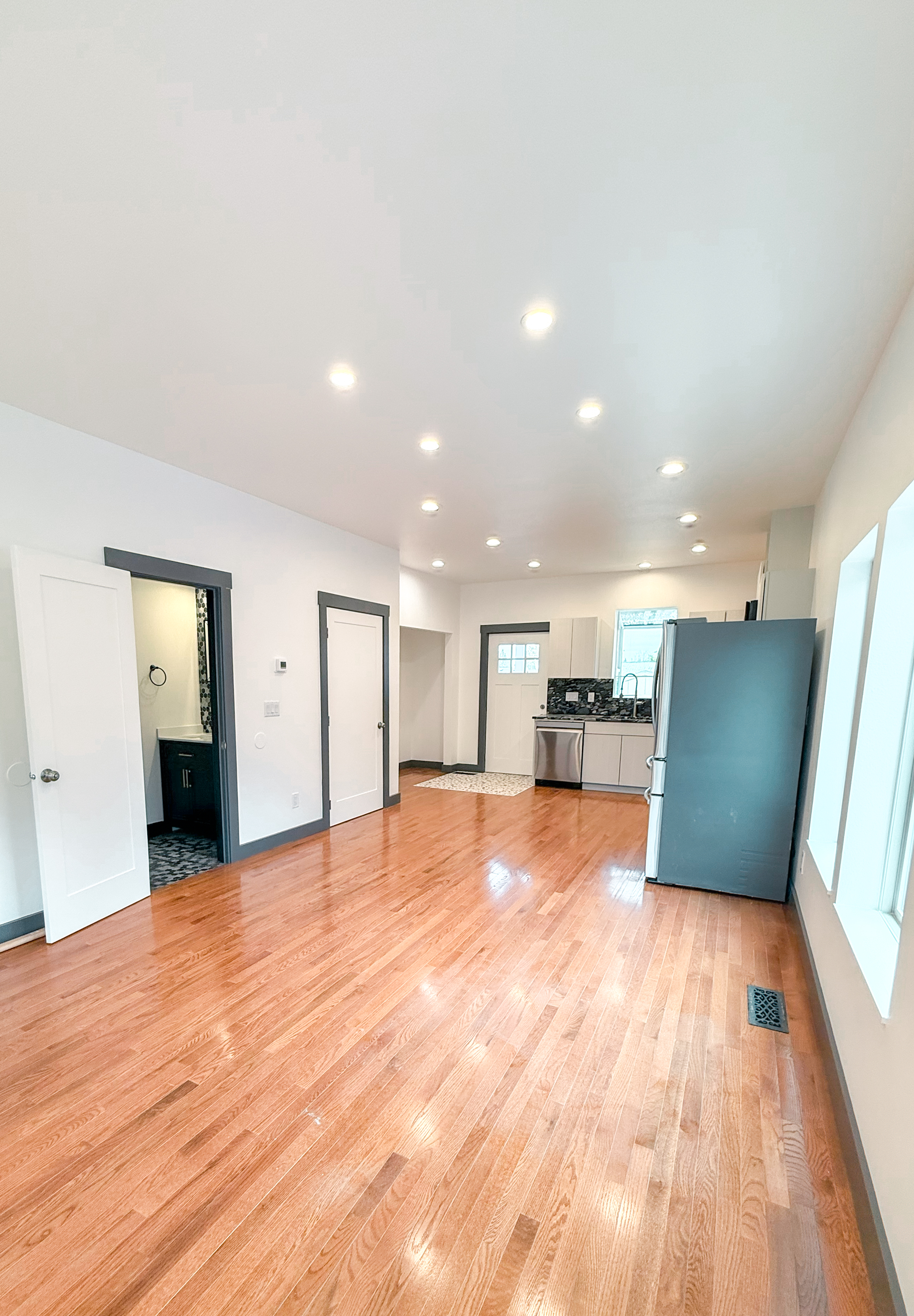 View from the living room toward the kitchen and entry.